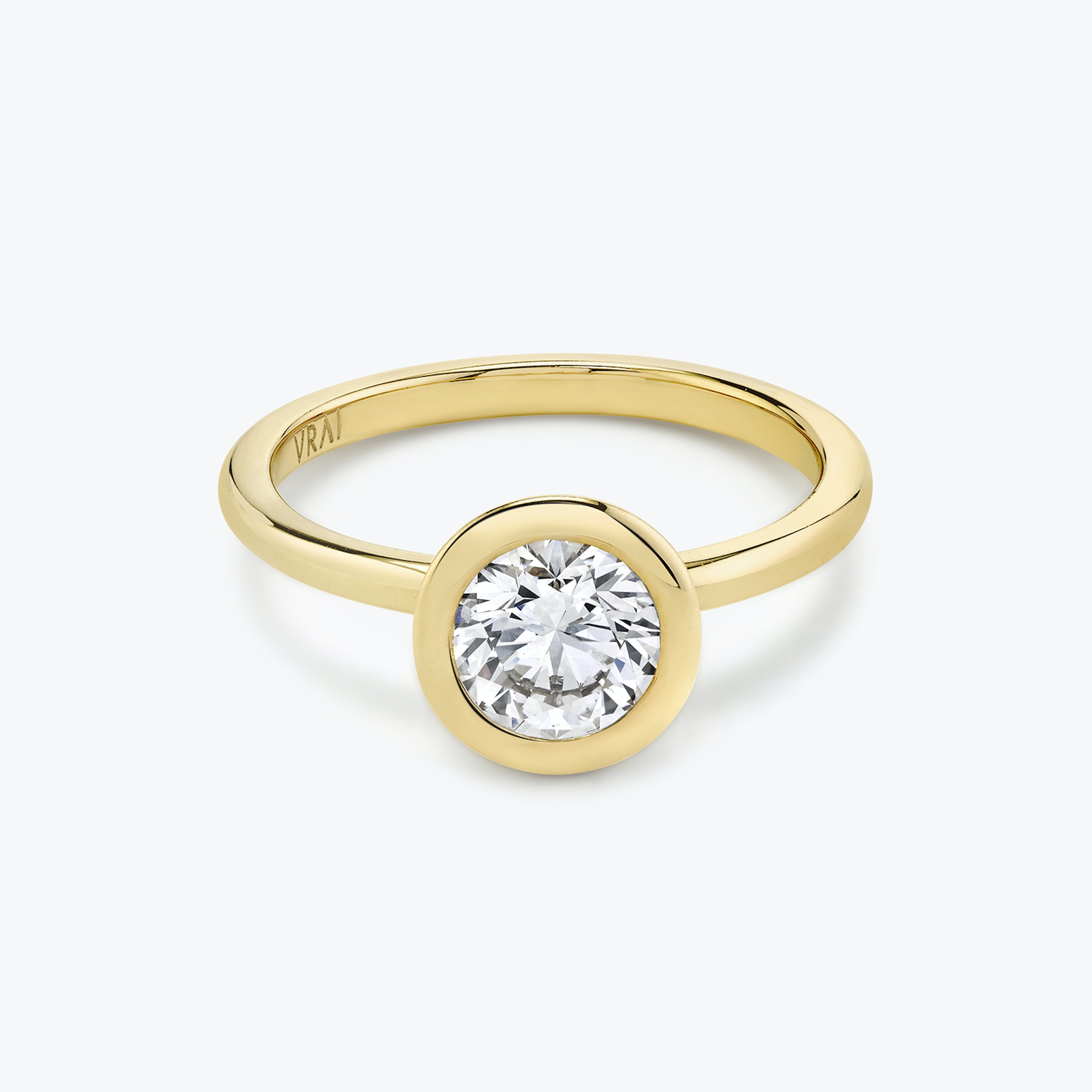 The Signature Bezel Round Brilliant Engagement Ring