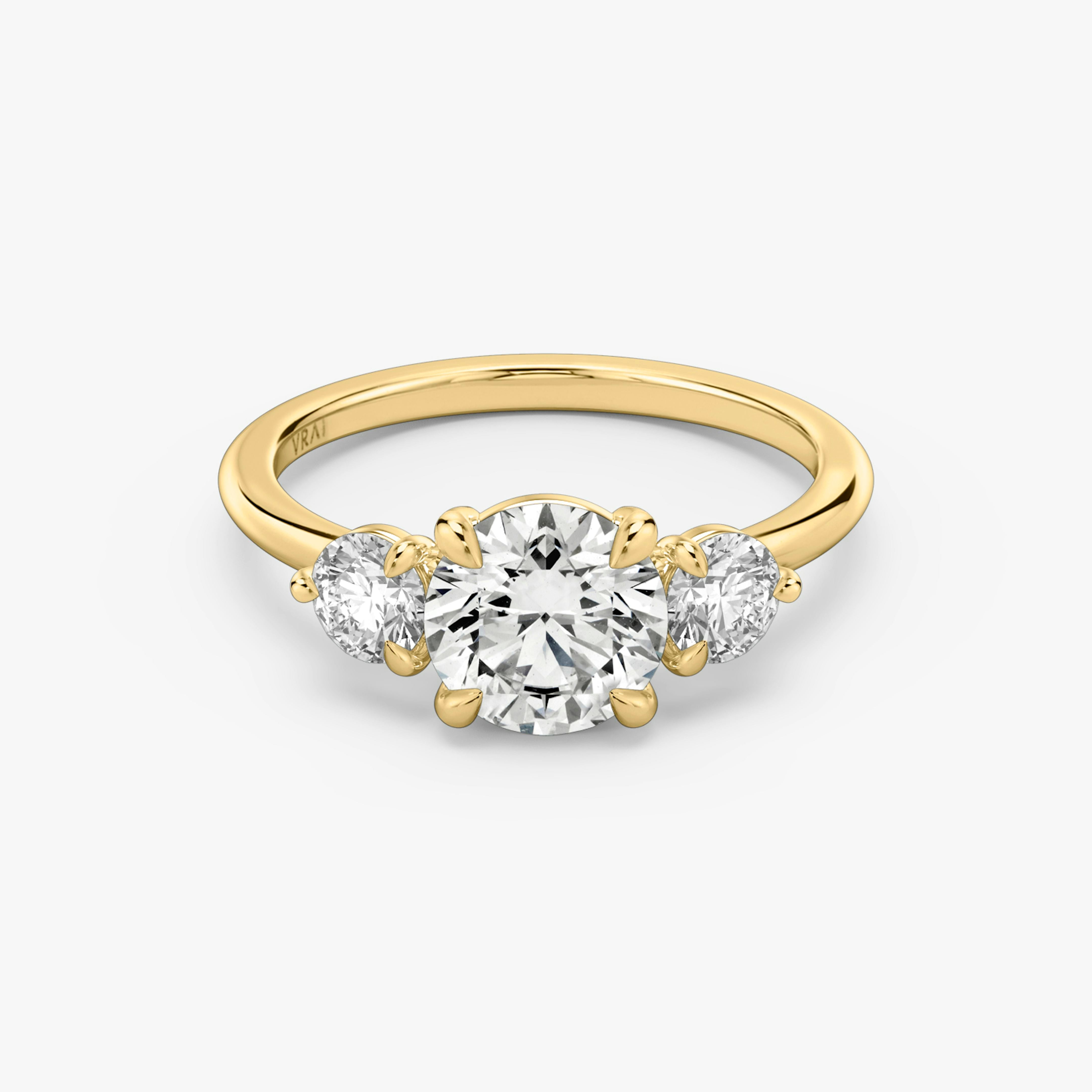 The Three Stone Round Brilliant Engagement Ring