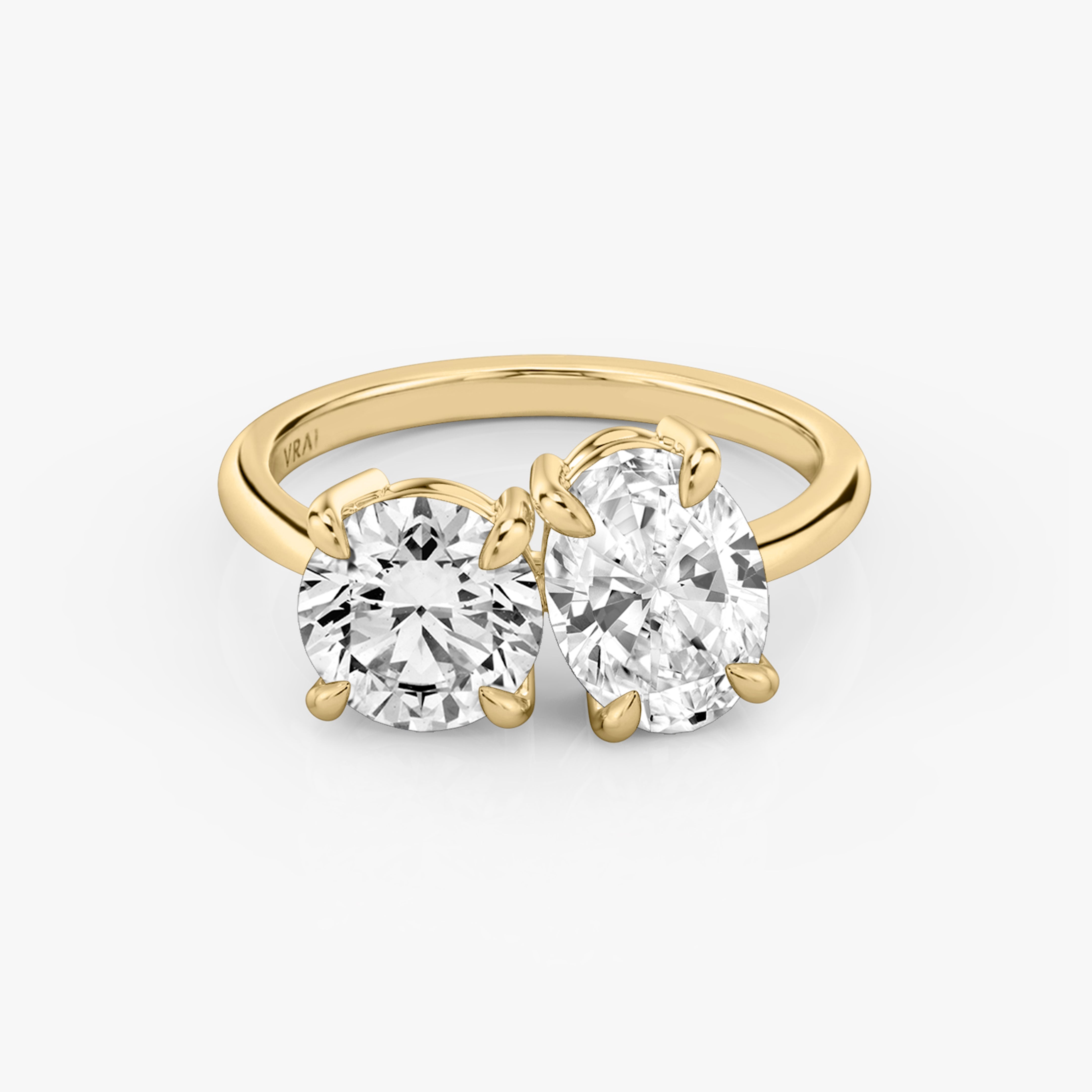 The Toi et Moi Round Brilliant and Oval Engagement Ring